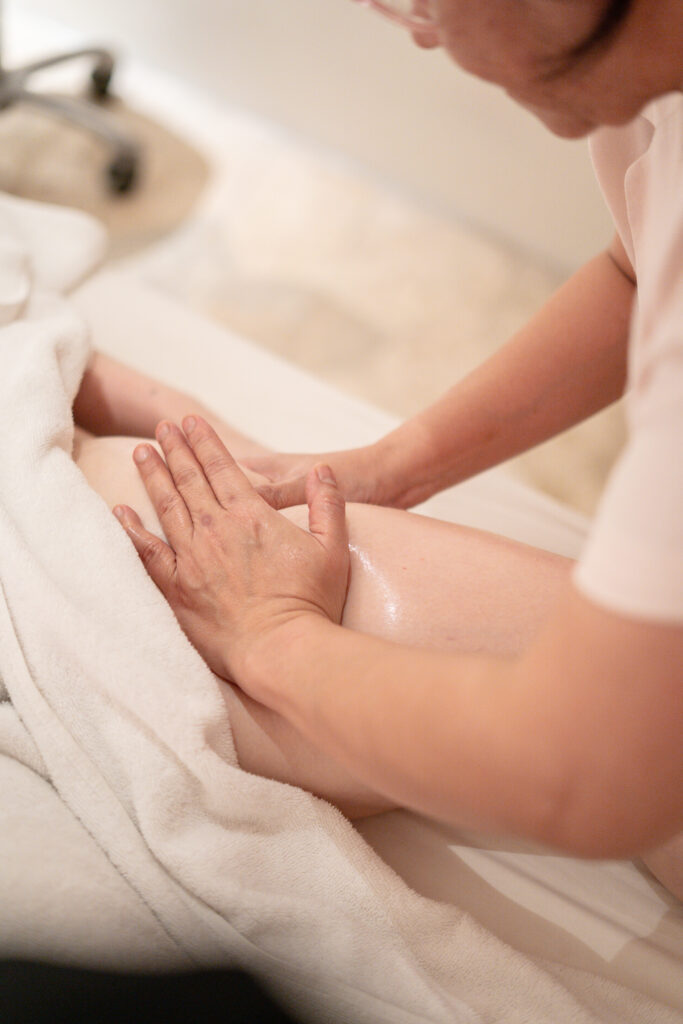 Massage table prepared for a lymphatic drainage treatment